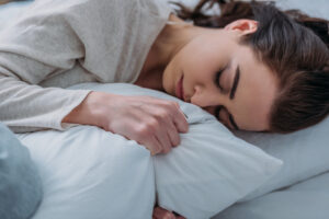 woman sleeping well in bed